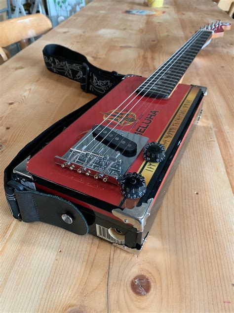 cigar box guitar electric four string|solid body cigar box guitar.